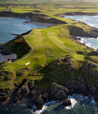 Ariel view of Nefyn Golf Club with the ocean surrounding the greens