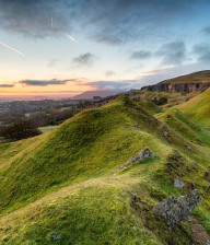 Panoramic view of the sun setting over the Welsh hills
