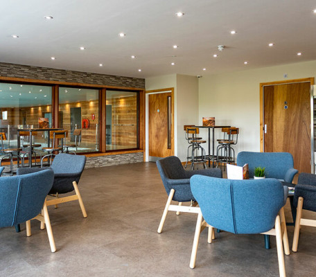 Relaxed bar and seating area at Juliots Well Holiday Park, Cornwall