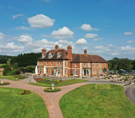 Aerial view of the landscaped grounds around the Manor House at The Astbury